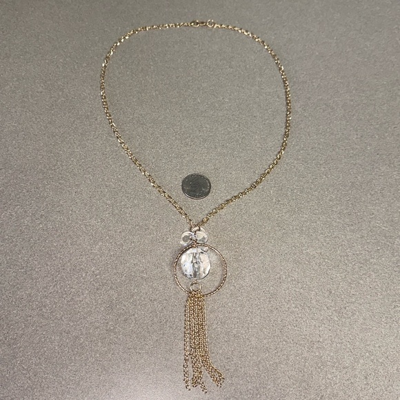 Gold colored necklace with clear faceted plastic bead and four flat round beads - Picture 2 of 4